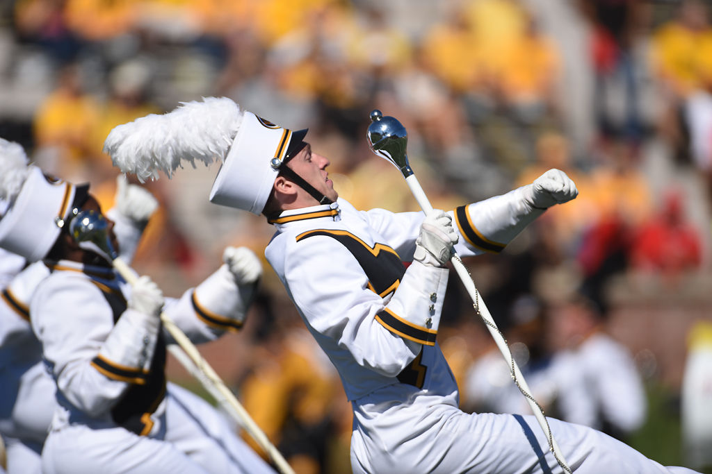 Marching Mizzou members strut across Faurot Field